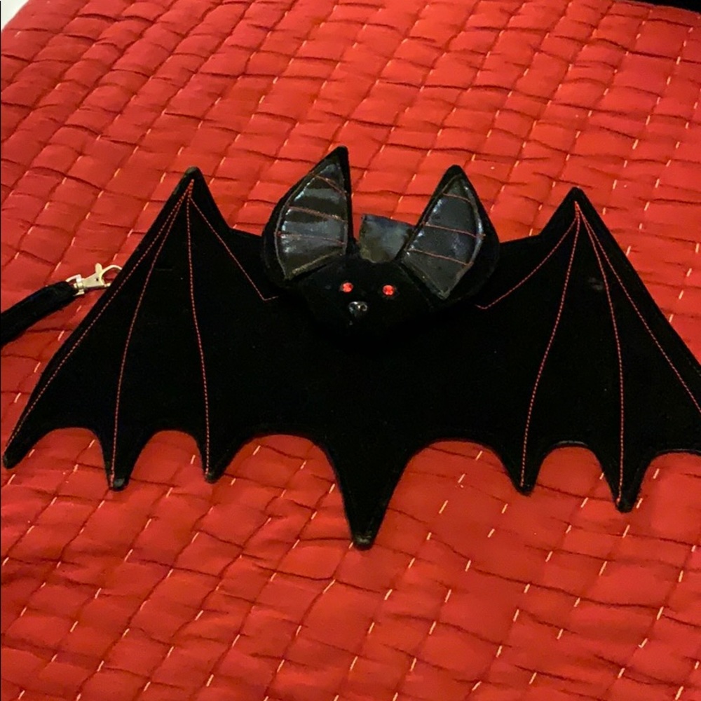 Bat shaped velvet clutch